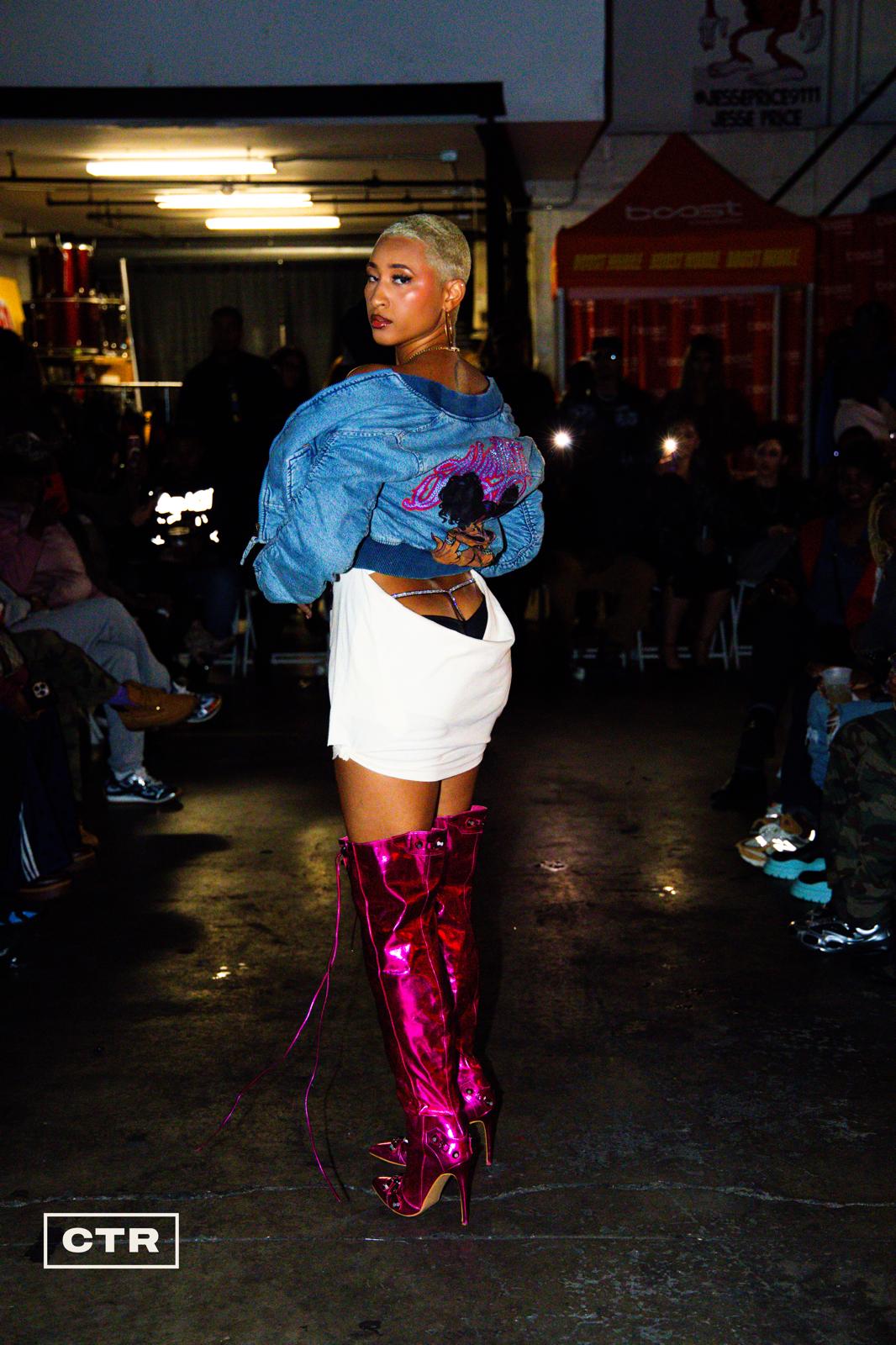 Runway — patched hoodie and emerald skirt