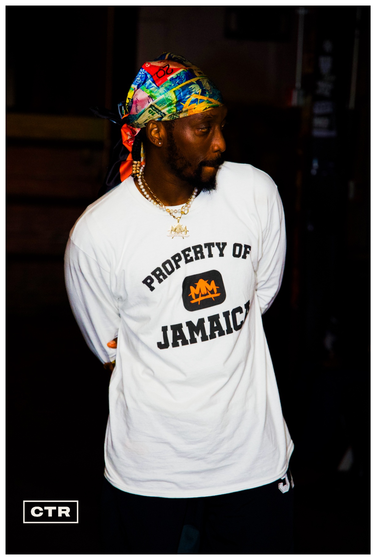 Fashion show — Jamaica shirt and colorful headwrap
