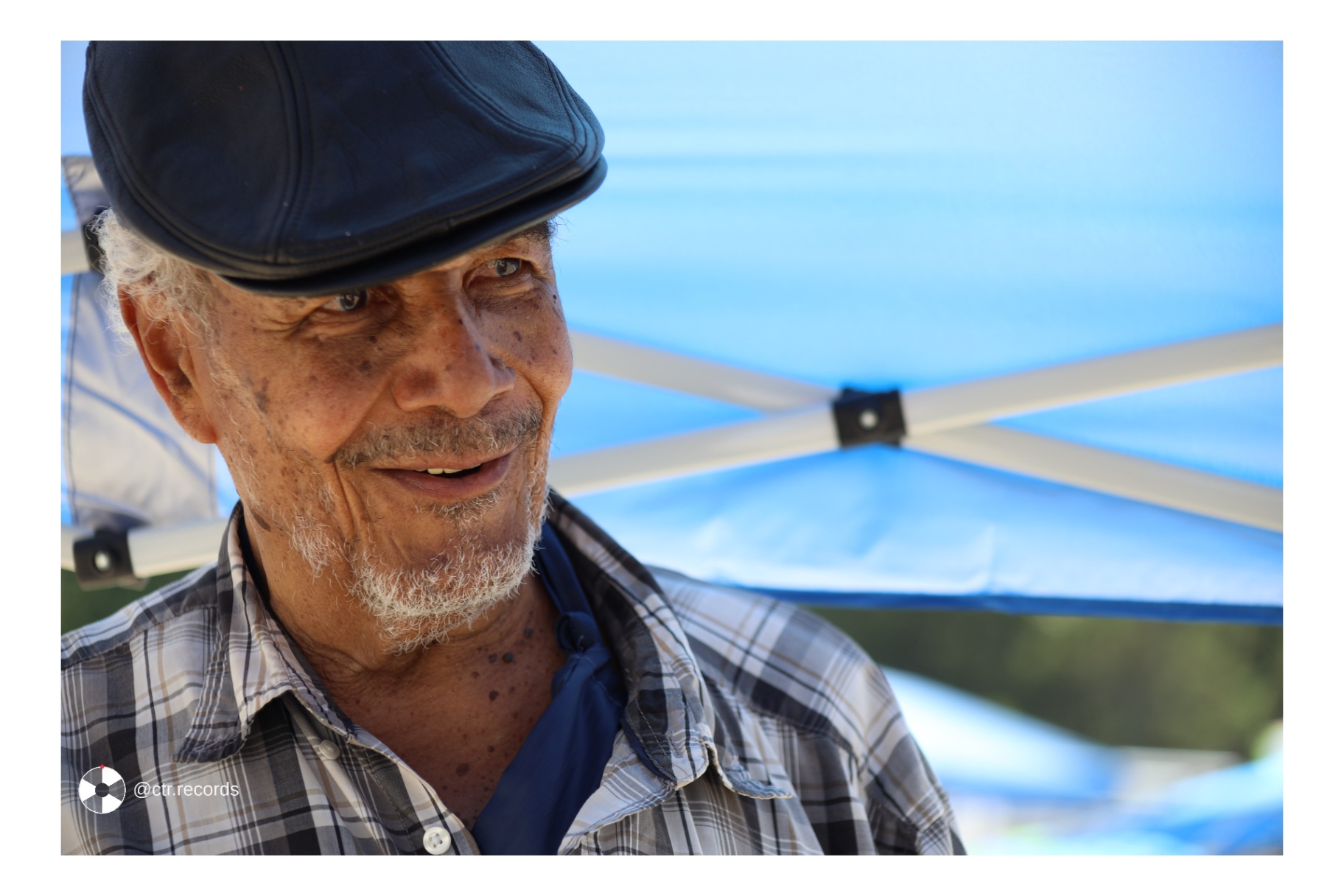 Portrait — under the blue canopy