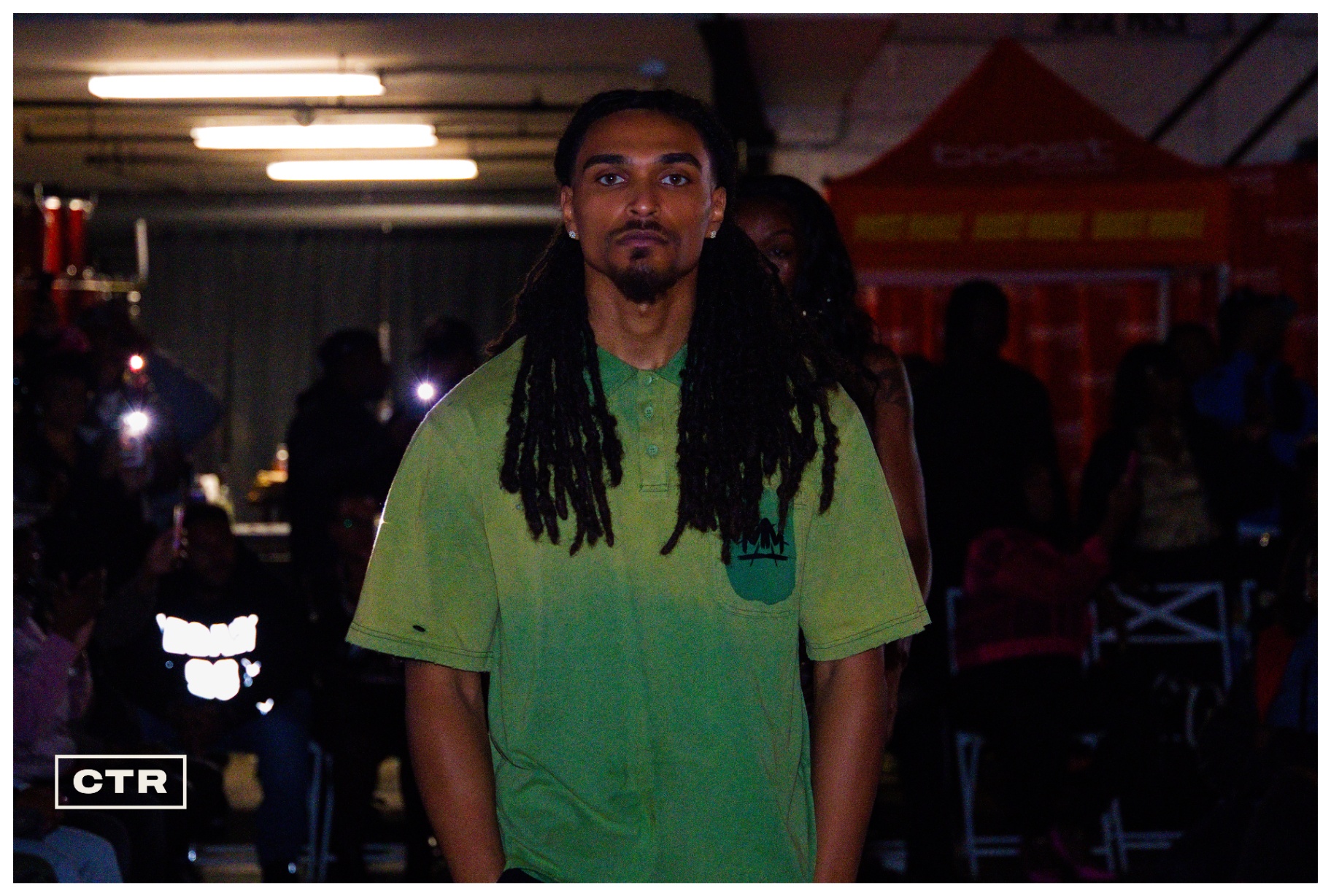 Runway — green polo and locs
