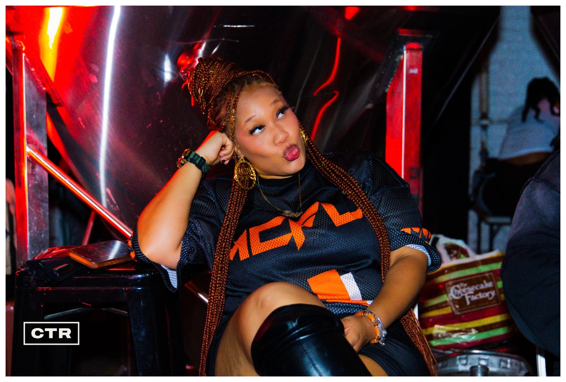 Fashion show — seated guest portrait