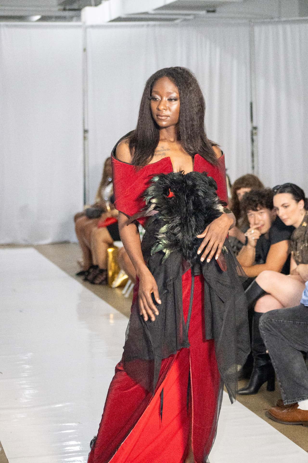 Runway — red gown, feathered corset