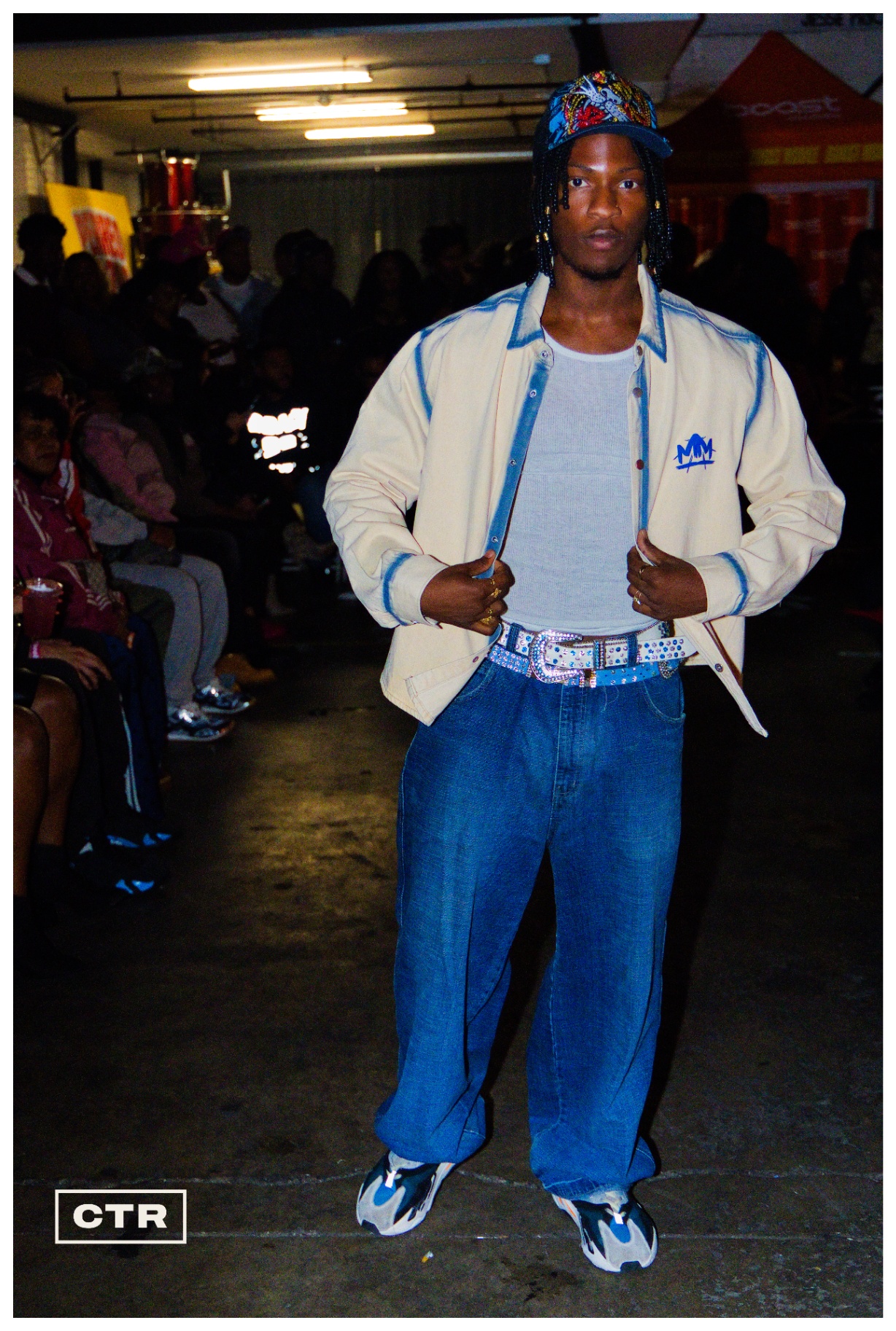 Runway — varsity jacket and blue denim