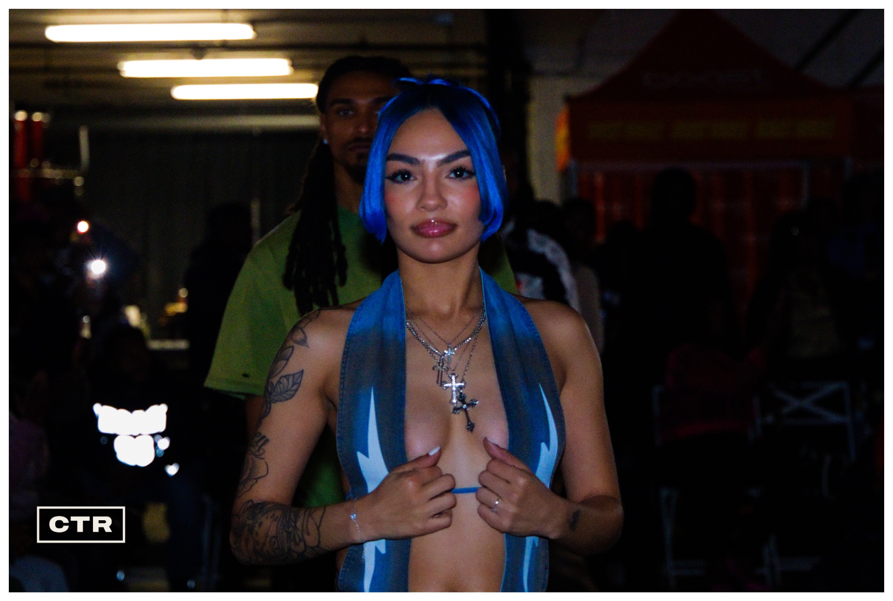 Runway — blue hair and silver scarf